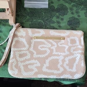 Brahmin brand clutch wristlet featuring a distinctive embossed leather pattern. 